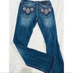 Miss me dark wash boot cut denim jeans.